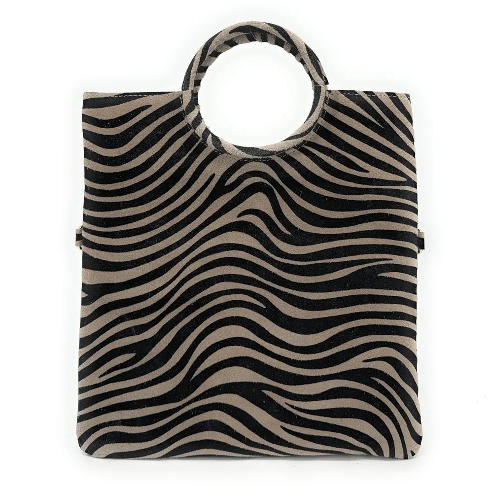 Sac pochette en croûte de cuir CHARLOTTE ET LEO Zèbre taupe