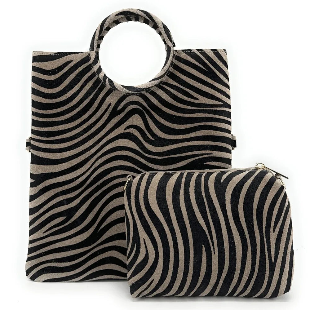 Sac pochette en croûte de cuir CHARLOTTE ET LEO Zèbre taupe