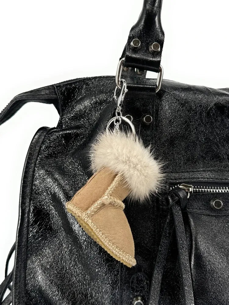 Porte-clés en croûte de cuir FLY ME TO THE MOON Taupe