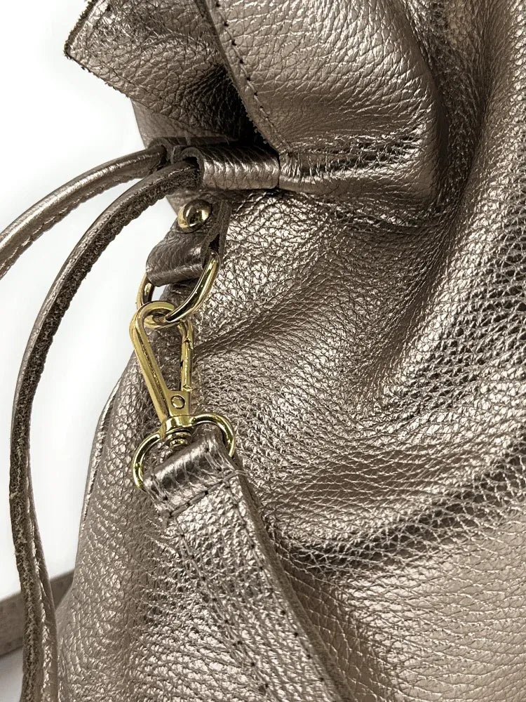 Sac bourse en cuir grainé ou irisé DOONA Champagne irisé