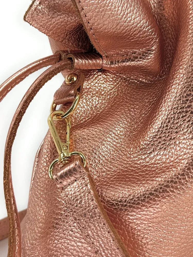 Sac bourse en cuir grainé ou irisé DOONA Rose gold