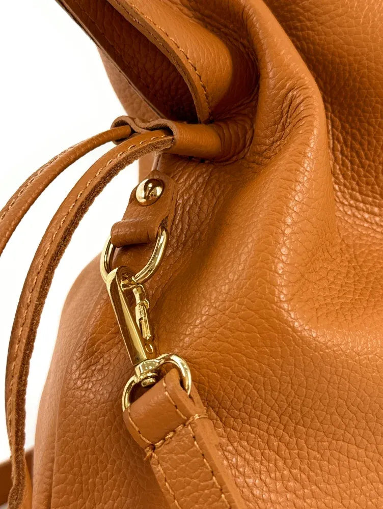 Sac bourse en cuir grainé ou irisé DOONA Camel