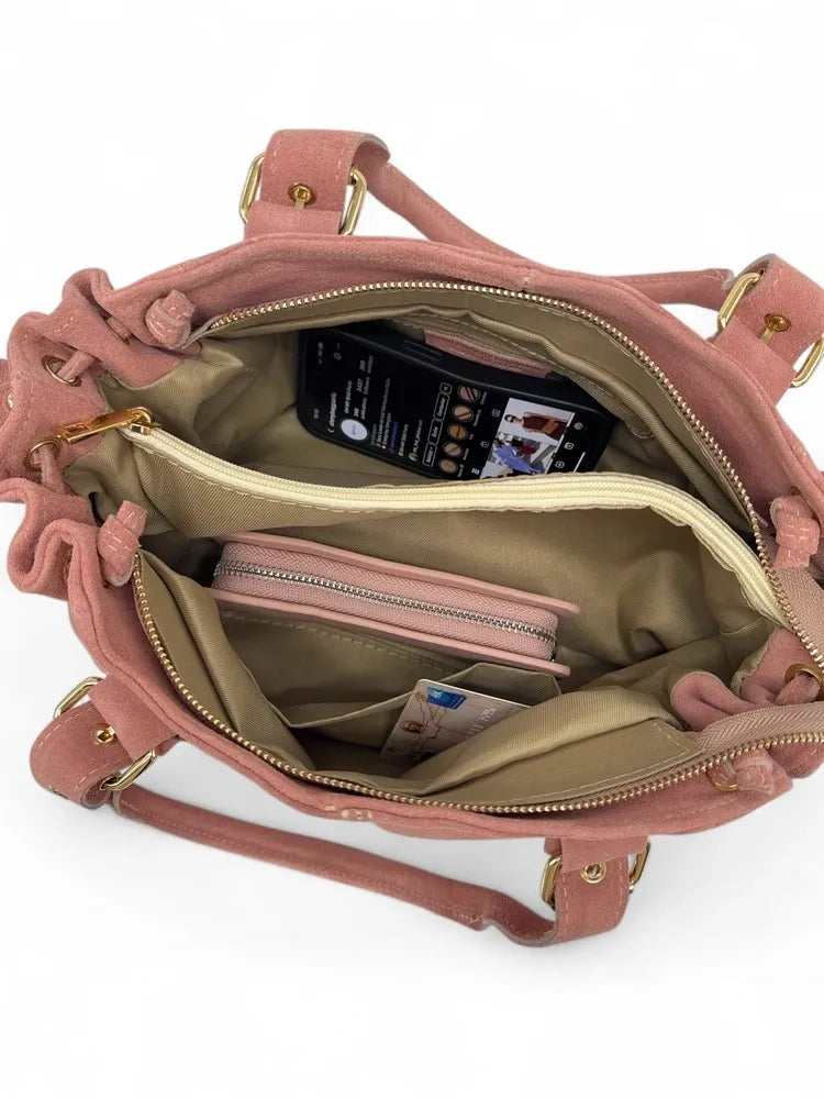 Sac bowling en croûte de cuir PRINCESSE SUEDE Rose bonbon