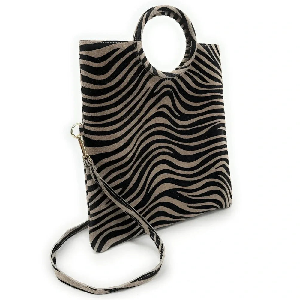 Sac pochette en croûte de cuir CHARLOTTE ET LEO Zèbre taupe